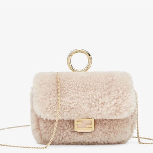 Fendi Handbags - Fendi FF nano baguette shearling leather charm crossbody bag NEW